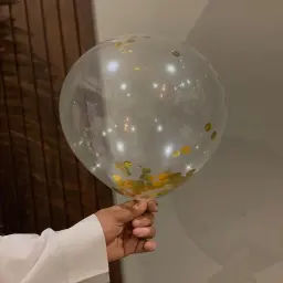 بالون شفاف قصاصات ذهبي